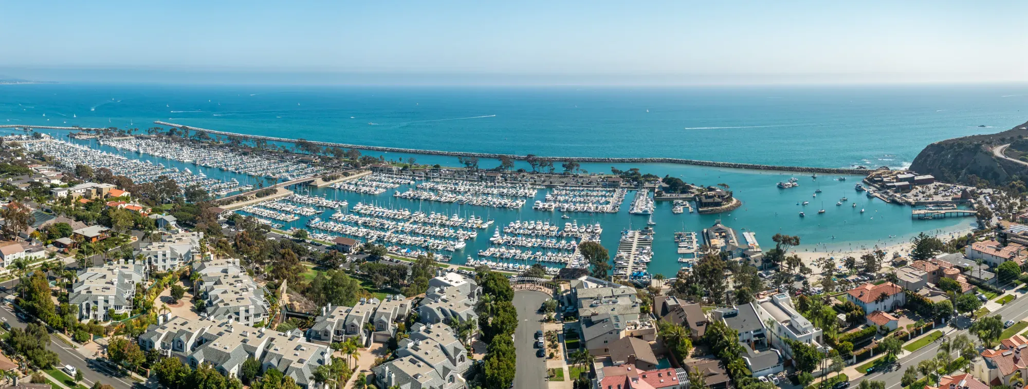 Aerial view of Dana Point Harbor and jetty